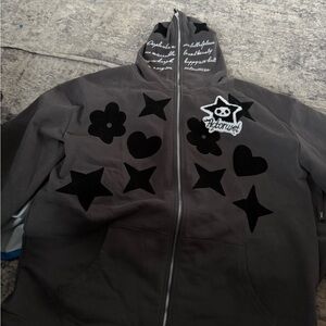 Stylish Jacket with Black Star and Heart Accents